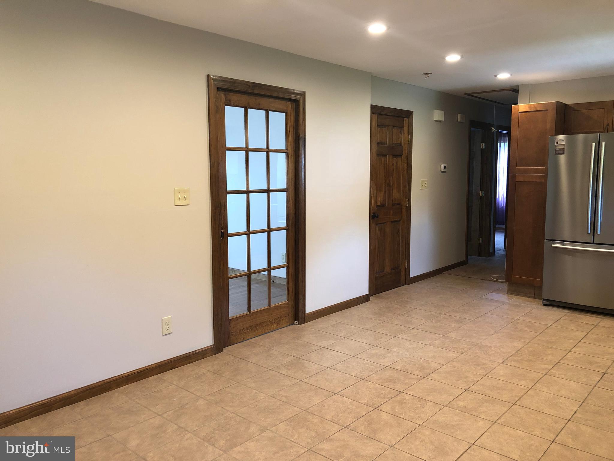 763 Garton Road Bridgeton, NJ 08302 - Photo 11 of 22 Kitchen/Dining Area with Pocket Door