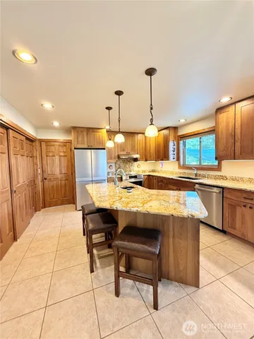 a living room with furniture and a table
