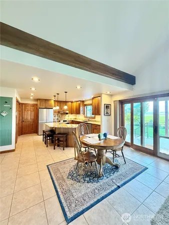 a living room with furniture and a table