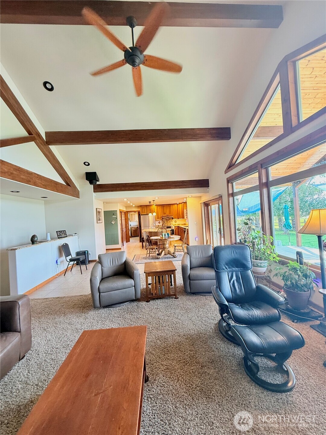 129 Robinson Canyon Road Omak, WA 98841 - Photo 16 of 40 a living room with furniture and a large window