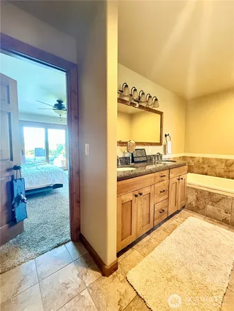 a large kitchen with a stove a sink and dishwasher