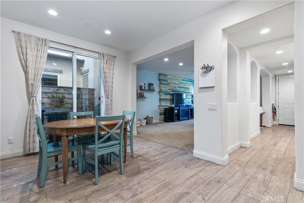 9354 Riberena Circle Atascadero, CA 93422 - Photo 11 of 47 a view of a dining room with furniture and wooden floor