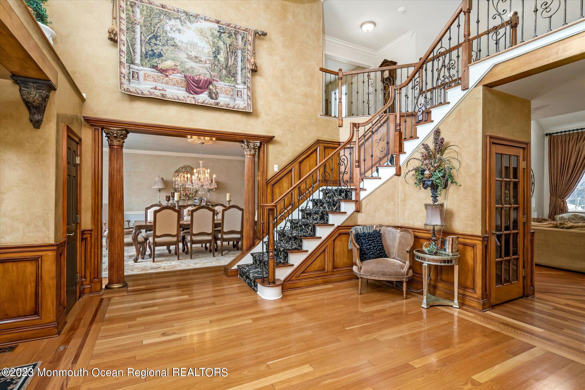 27 Millennium Drive Columbus, NJ 08022 - Photo 13 of 82 a view of entryway livingroom and hall with wooden floor