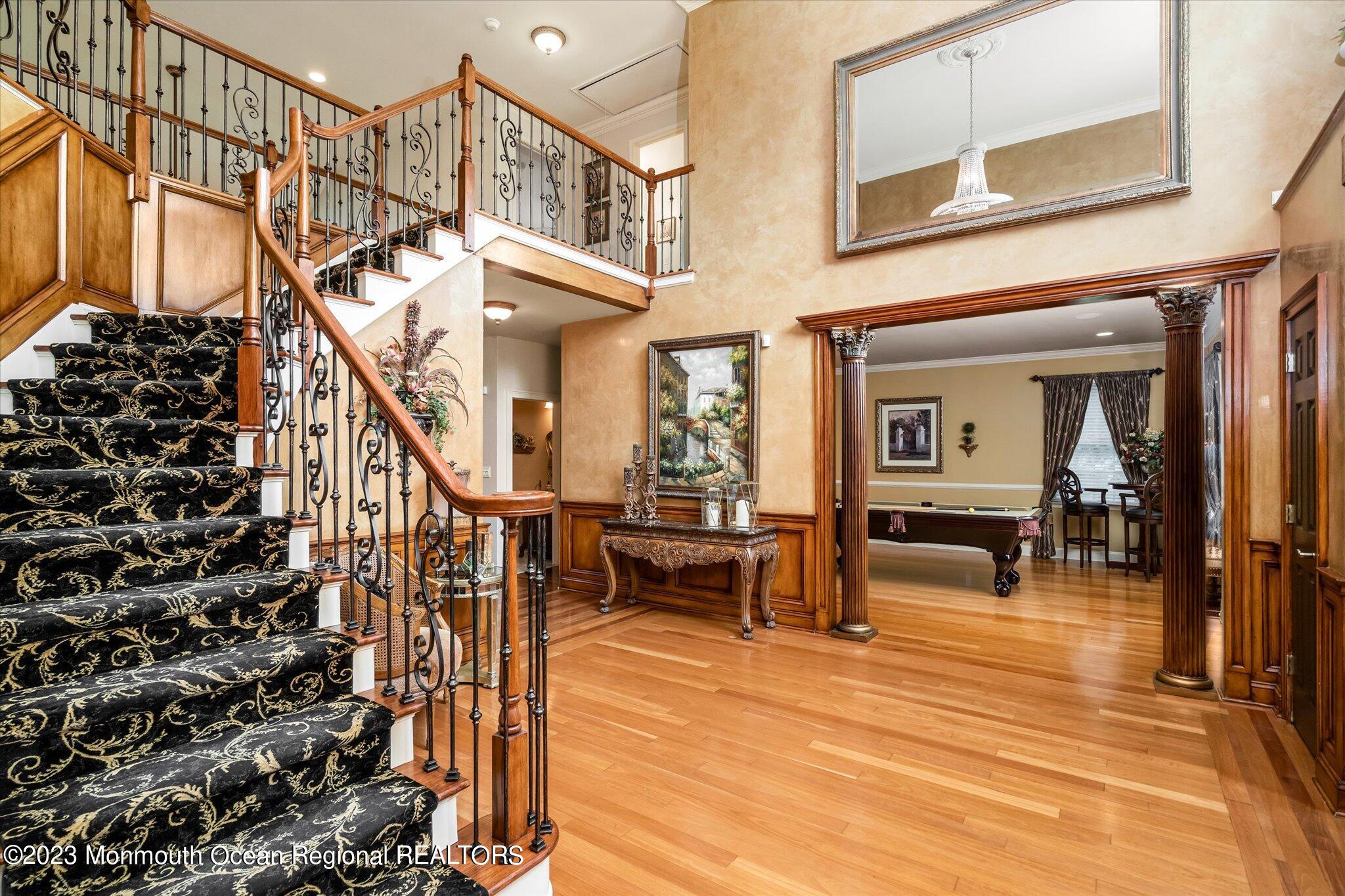 27 Millennium Drive Columbus, NJ 08022 - Photo 16 of 82 a view of entryway livingroom and hall with wooden floor