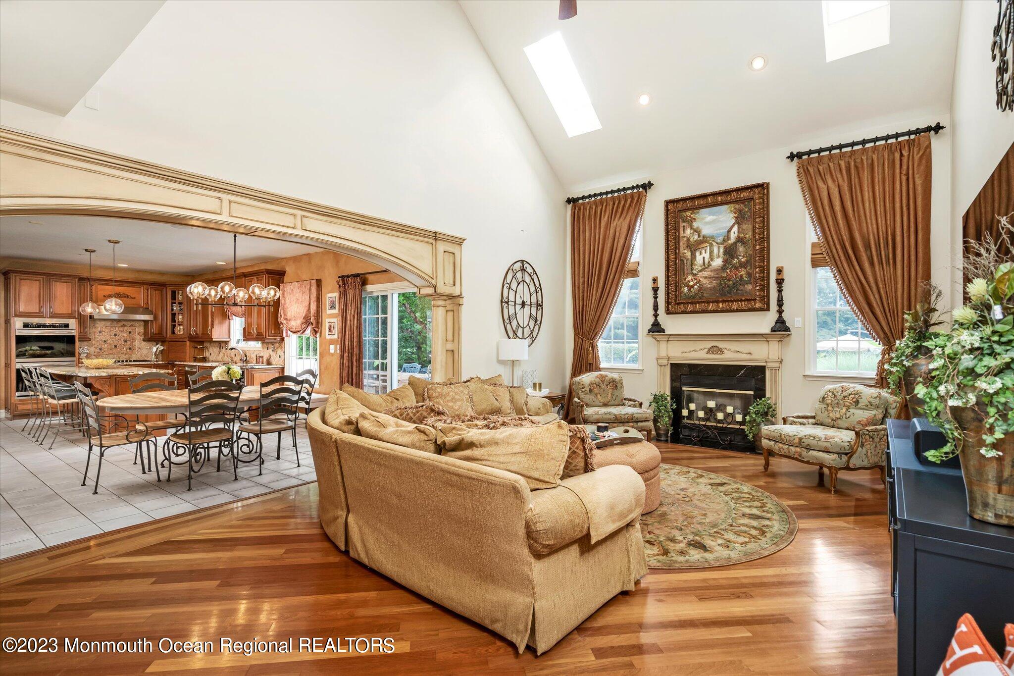 27 Millennium Drive Columbus, NJ 08022 - Photo 21 of 82 a living room with fireplace furniture and a large window