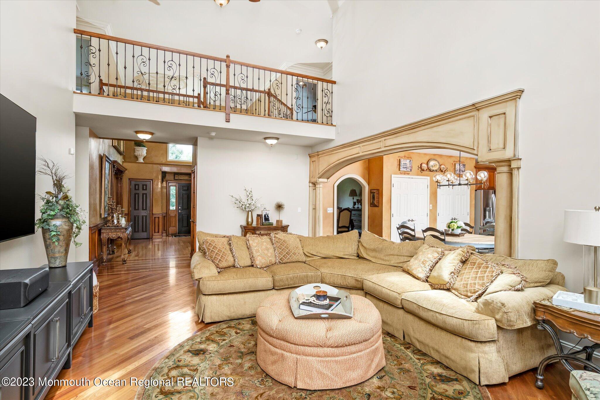 27 Millennium Drive Columbus, NJ 08022 - Photo 23 of 82 a living room with furniture and a large window