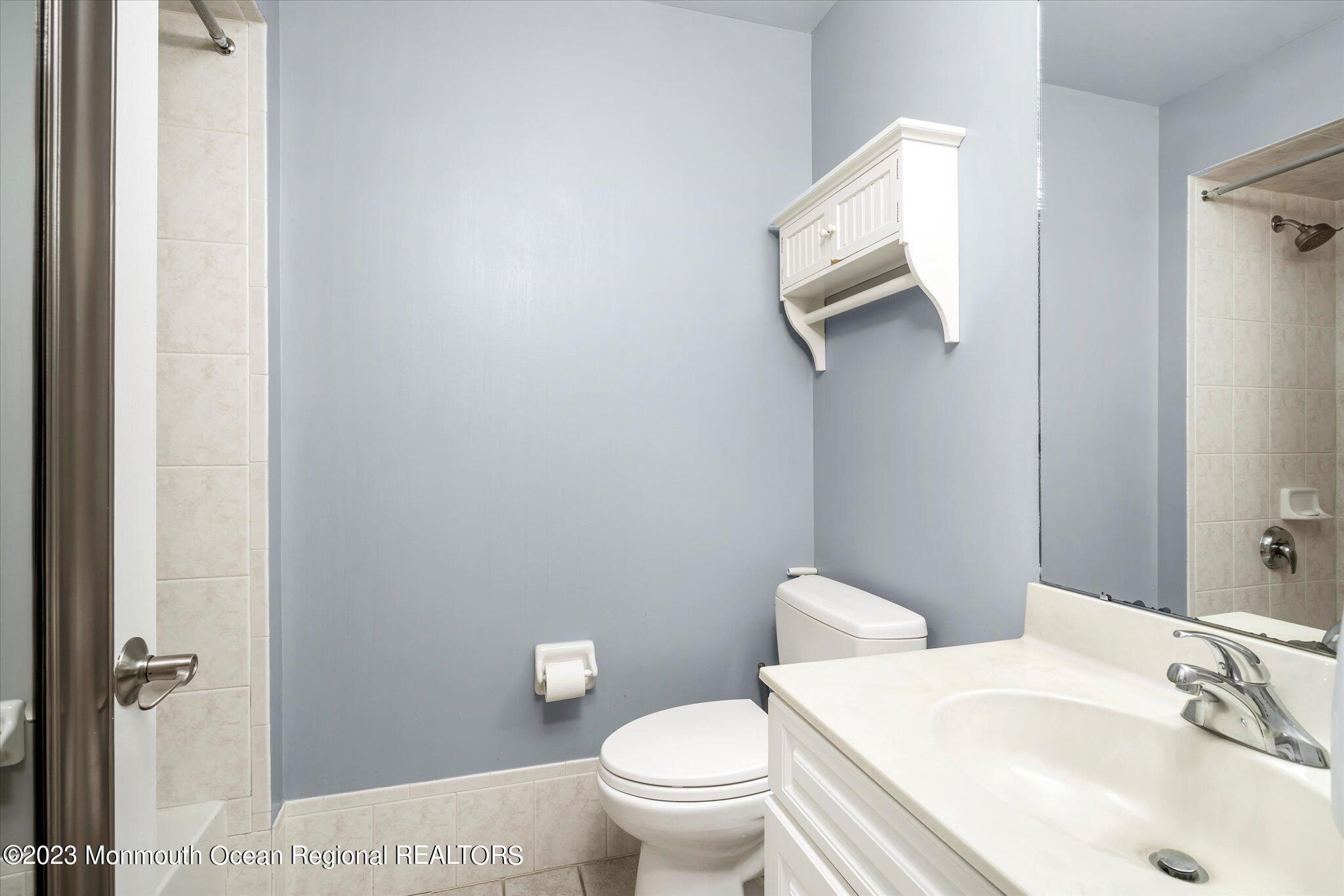 27 Millennium Drive Columbus, NJ 08022 - Photo 36 of 82 a bathroom with a toilet sink and mirror