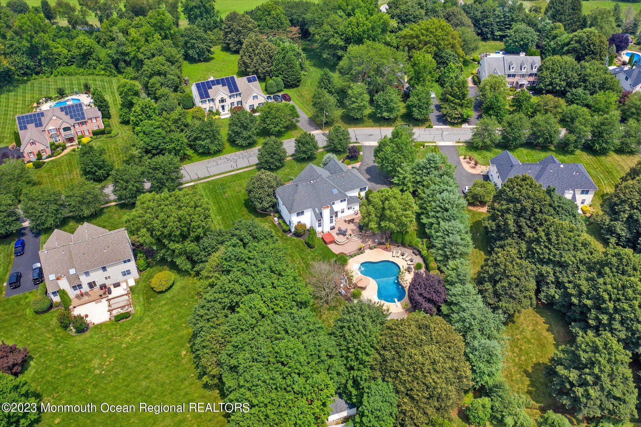 27 Millennium Drive Columbus, NJ 08022 - Photo 4 of 82 an aerial view of a house with a yard and lake view