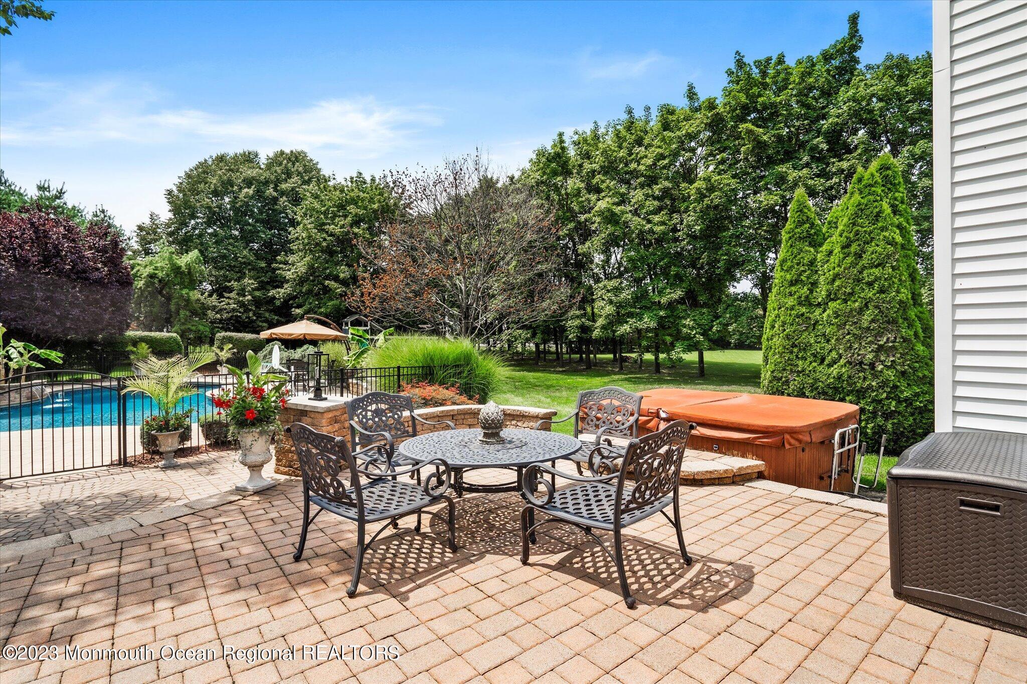 27 Millennium Drive Columbus, NJ 08022 - Photo 63 of 82 a view of backyard with seating area and green space