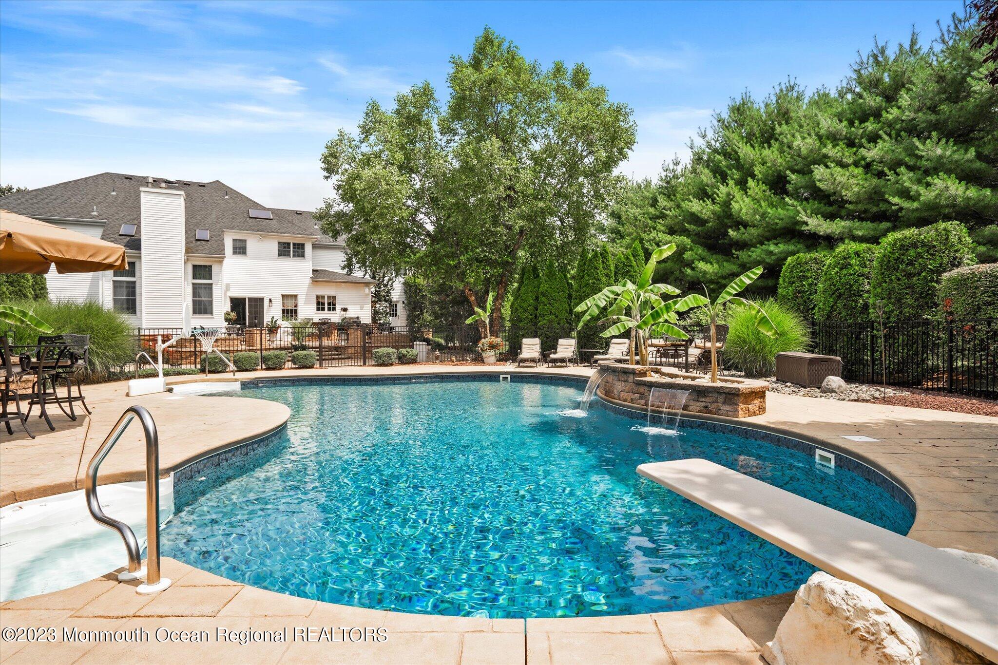 27 Millennium Drive Columbus, NJ 08022 - Photo 70 of 82 a view of a swimming pool with lounge chair