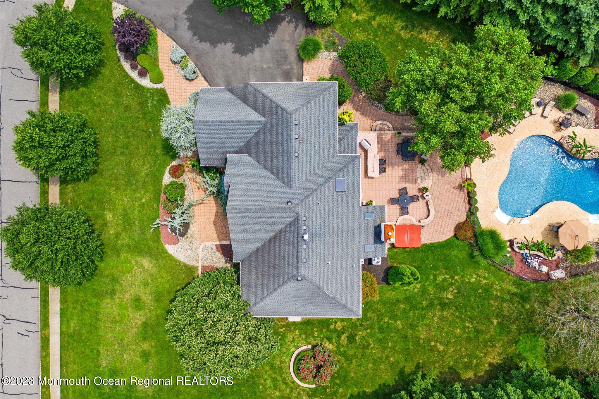 27 Millennium Drive Columbus, NJ 08022 - Photo 7 of 82 an aerial view of a house with garden space and street view
