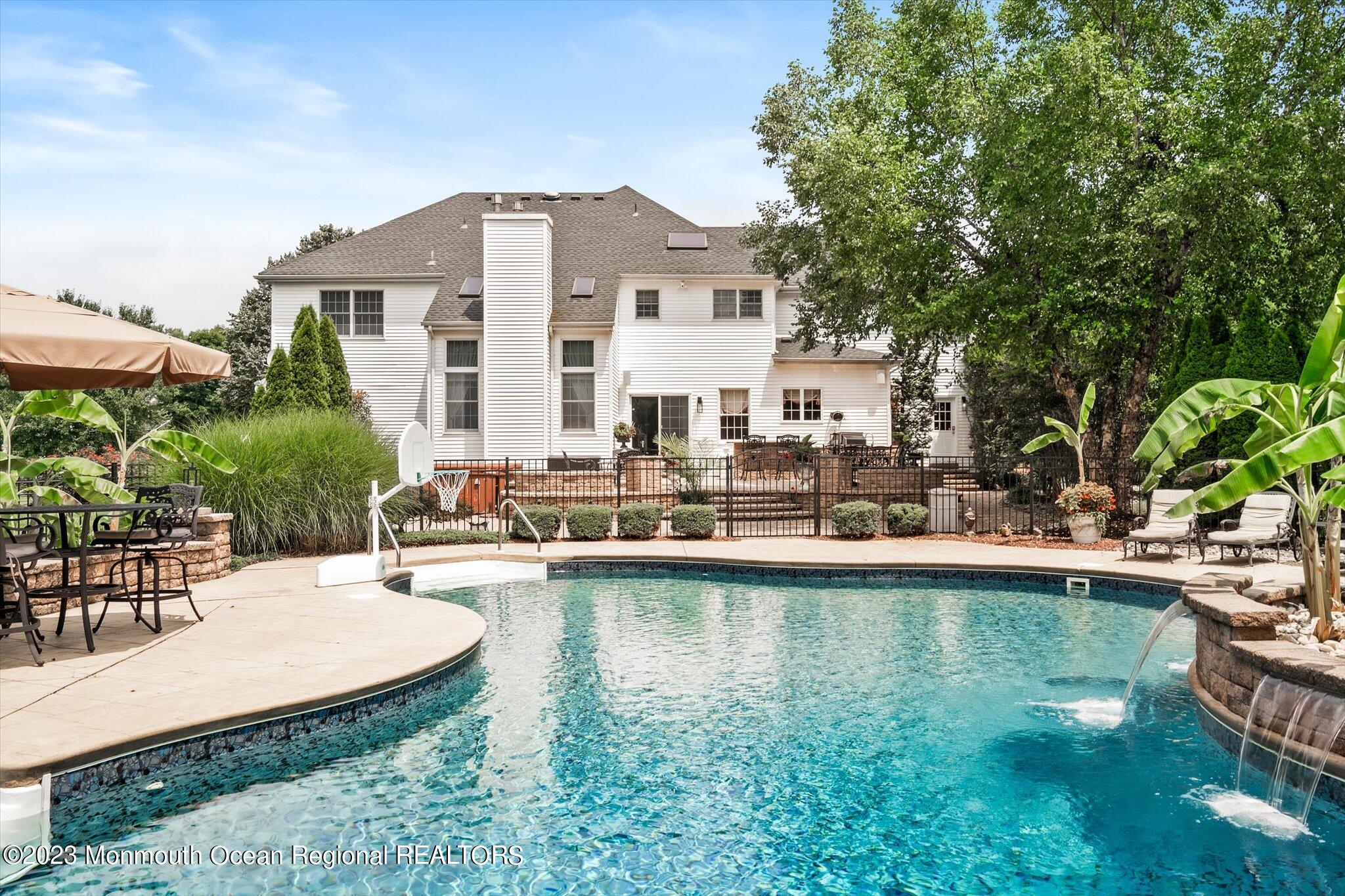 27 Millennium Drive Columbus, NJ 08022 - Photo 71 of 82 a view of a house with swimming pool and sitting area