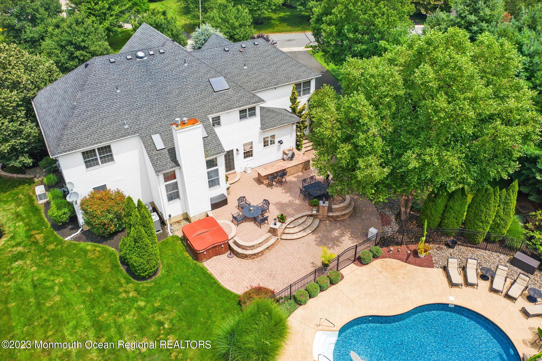 27 Millennium Drive Columbus, NJ 08022 - Photo 78 of 82 an aerial view of a house with swimming pool and patio