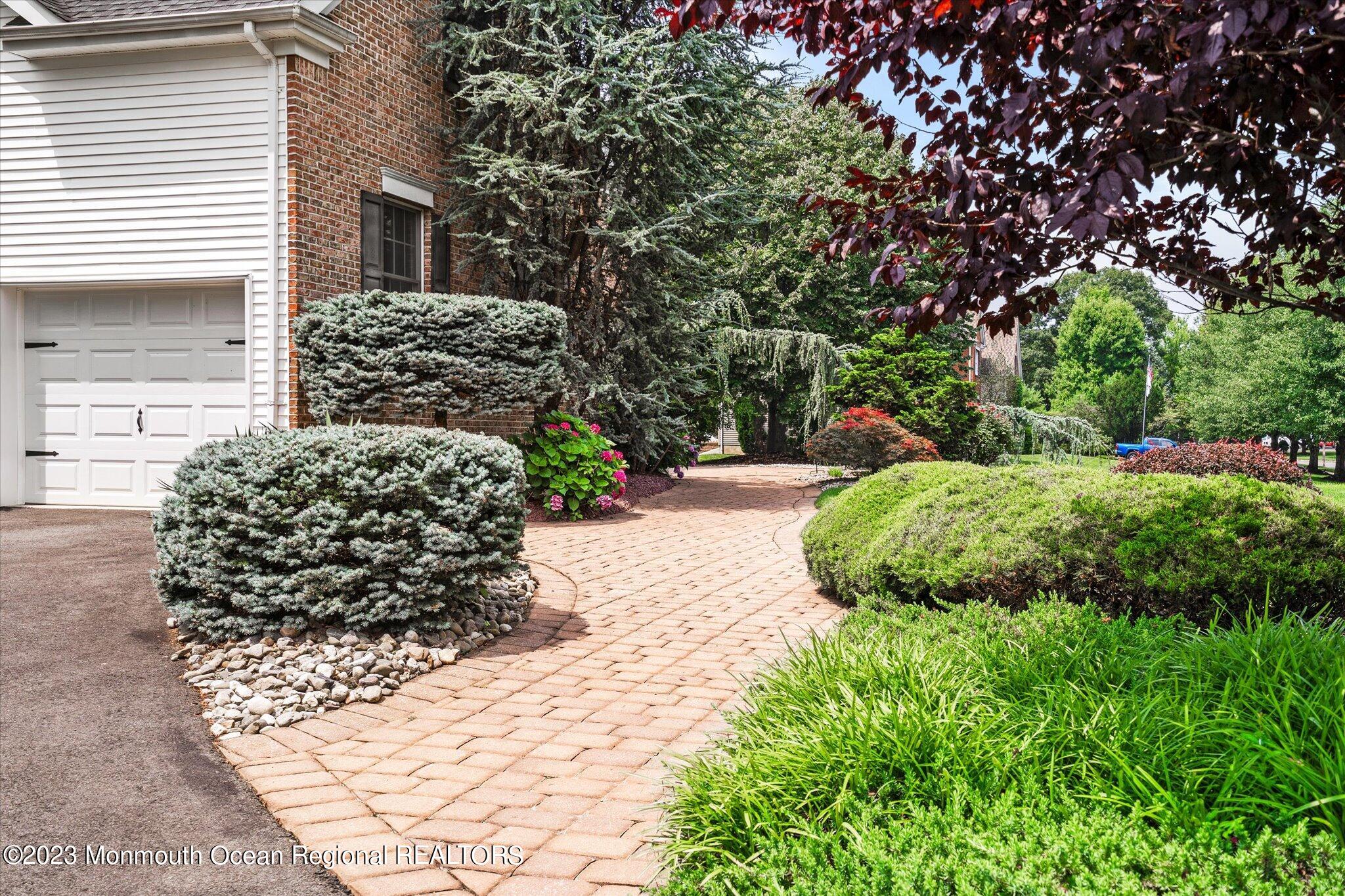 27 Millennium Drive Columbus, NJ 08022 - Photo 9 of 82 a view of a garden with a pathway
