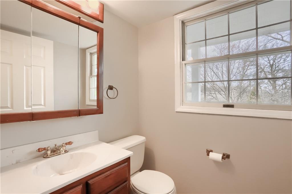 1889 Fairhill Road Allison Park, PA 15101 - Photo 15 of 25 The first floor half bath has a window, a marble sink and a window.