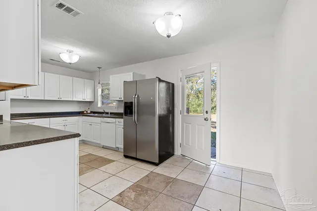 $215,000 | 4460 Santa Villa Drive, Pace, FL 32571