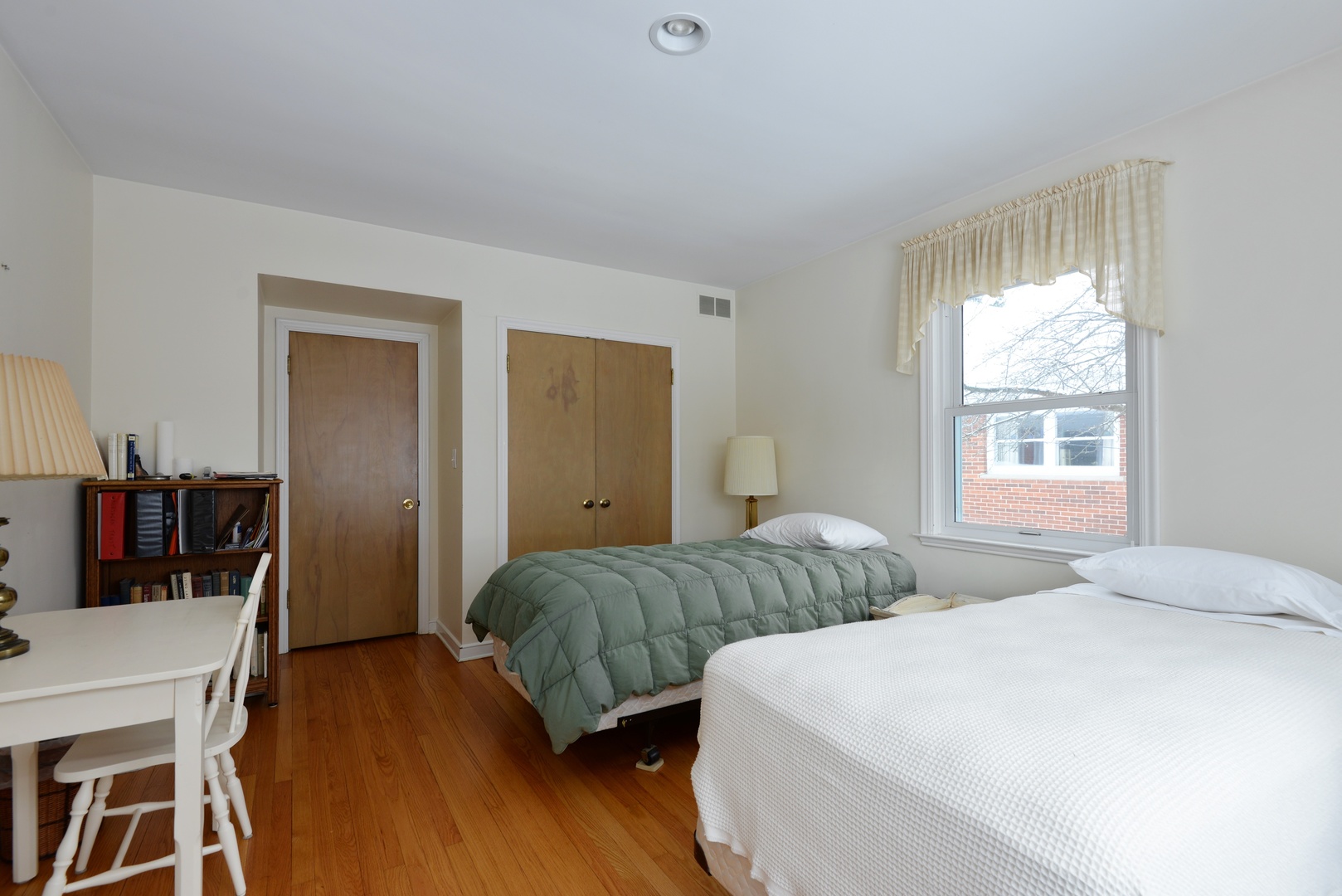 1135 Ridge Road Wilmette, IL 60091 - Photo 10 of 16 a bedroom with two beds and a dresser
