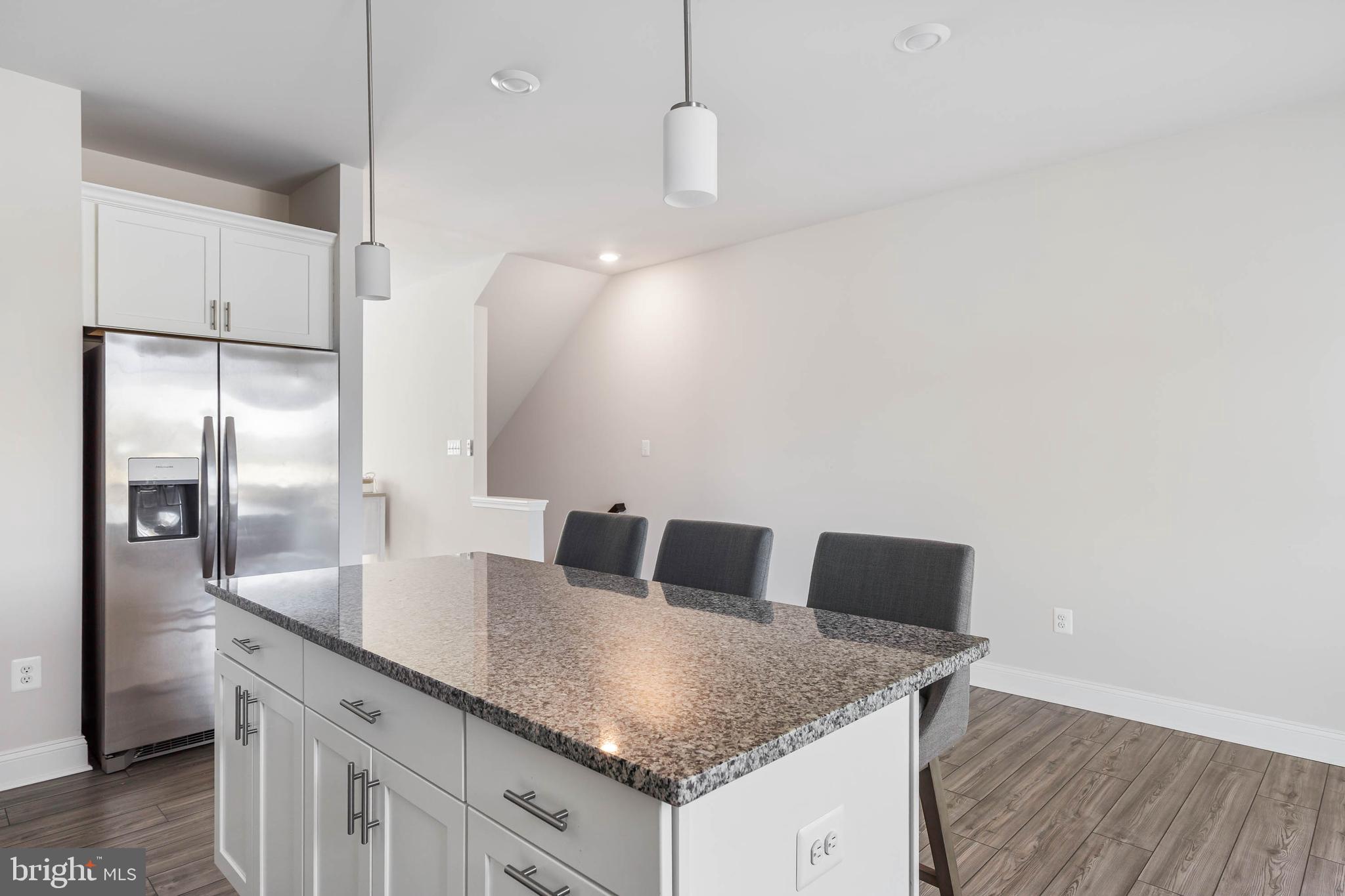 35303 Wright Way Millsboro, DE 19966 - Photo 11 of 26 a bathroom with a granite countertop sink and a mirror