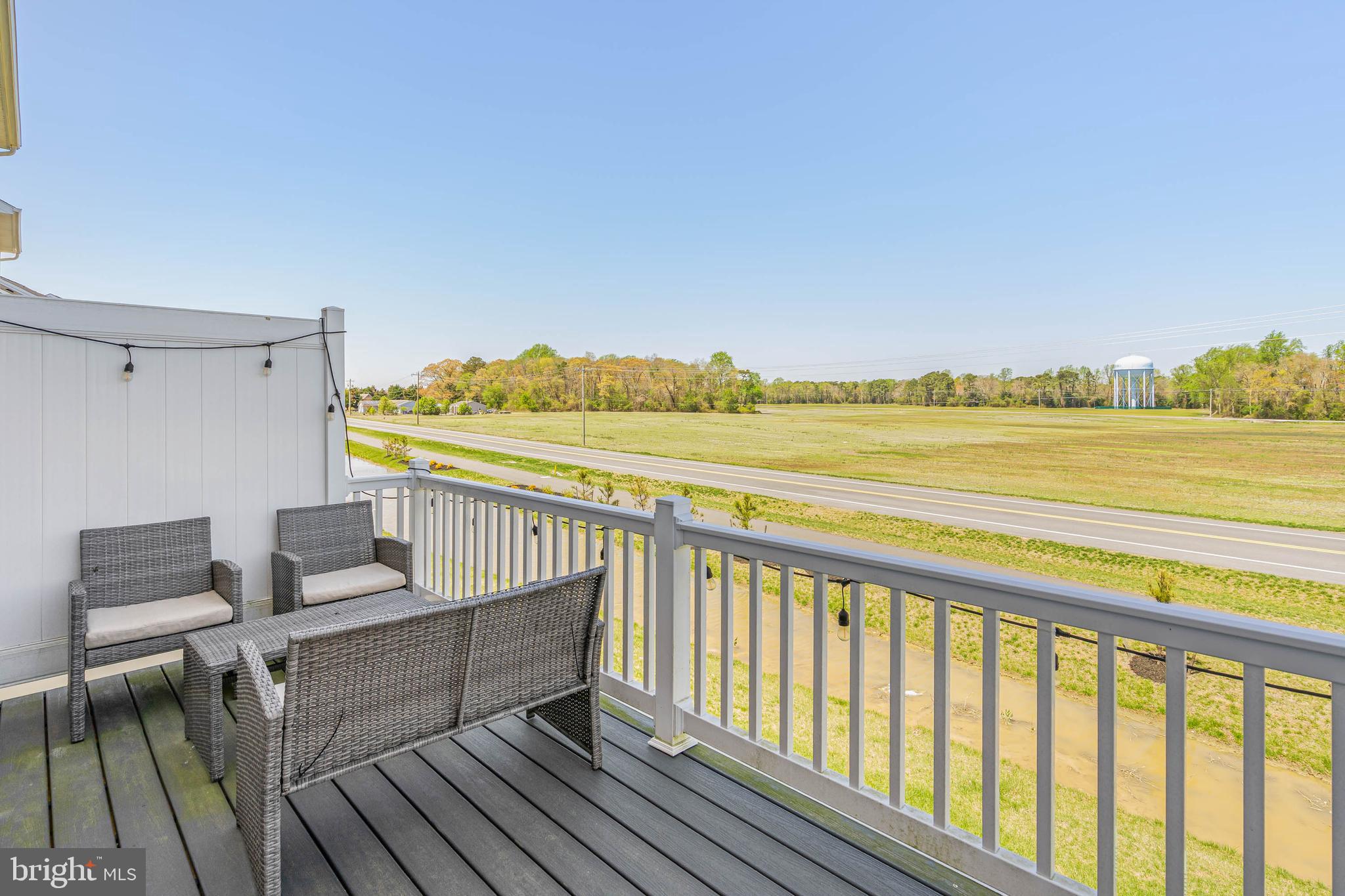35303 Wright Way Millsboro, DE 19966 - Photo 13 of 26 a view of a balcony with chairs