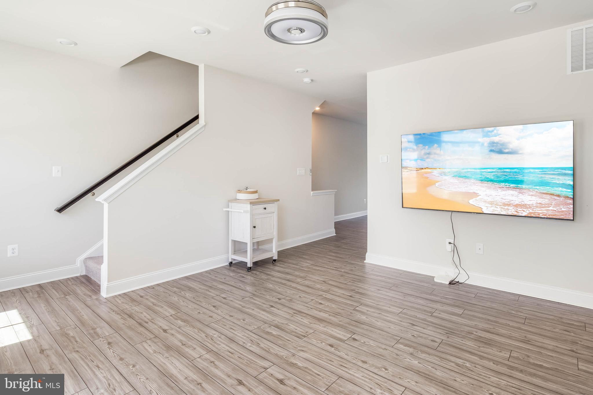 35303 Wright Way Millsboro, DE 19966 - Photo 16 of 26 a view of empty room with wooden floor