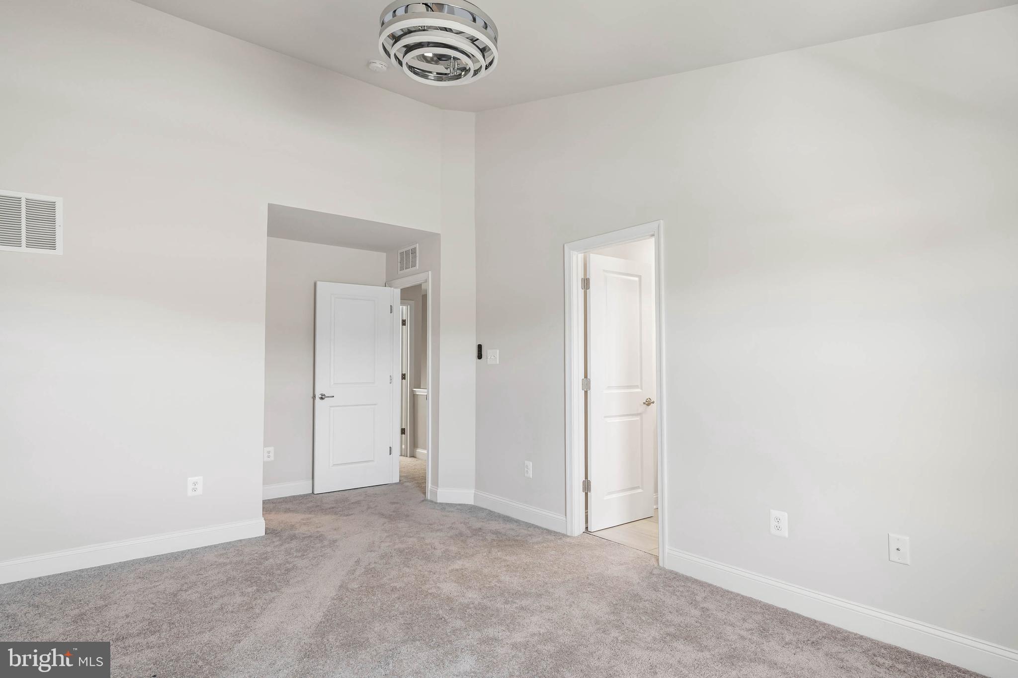 35303 Wright Way Millsboro, DE 19966 - Photo 20 of 26 an empty room with a hallway