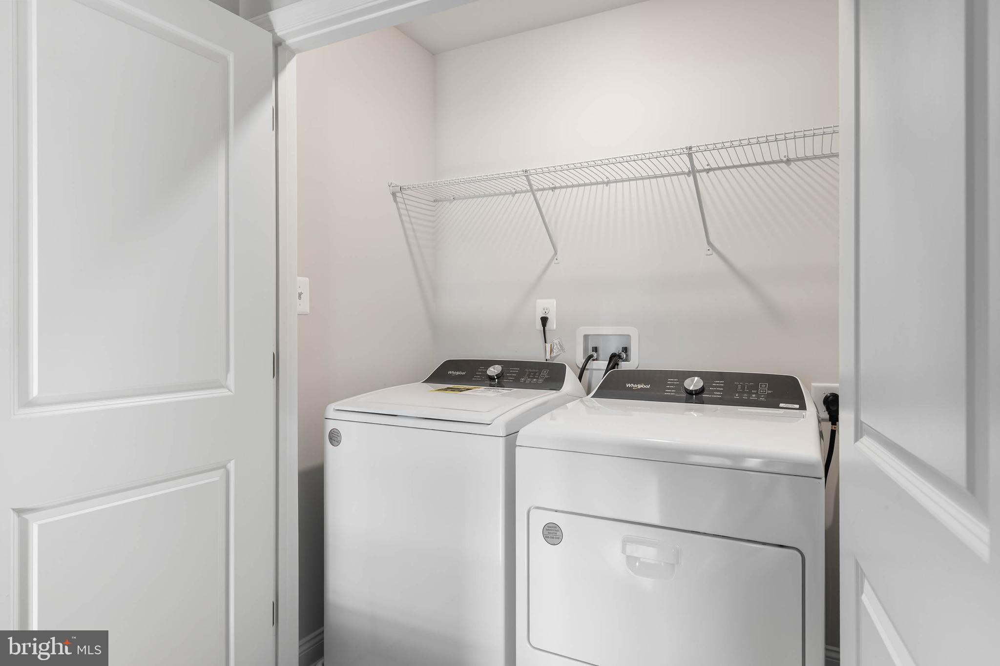 35303 Wright Way Millsboro, DE 19966 - Photo 26 of 26 a utility room with dryer and washer