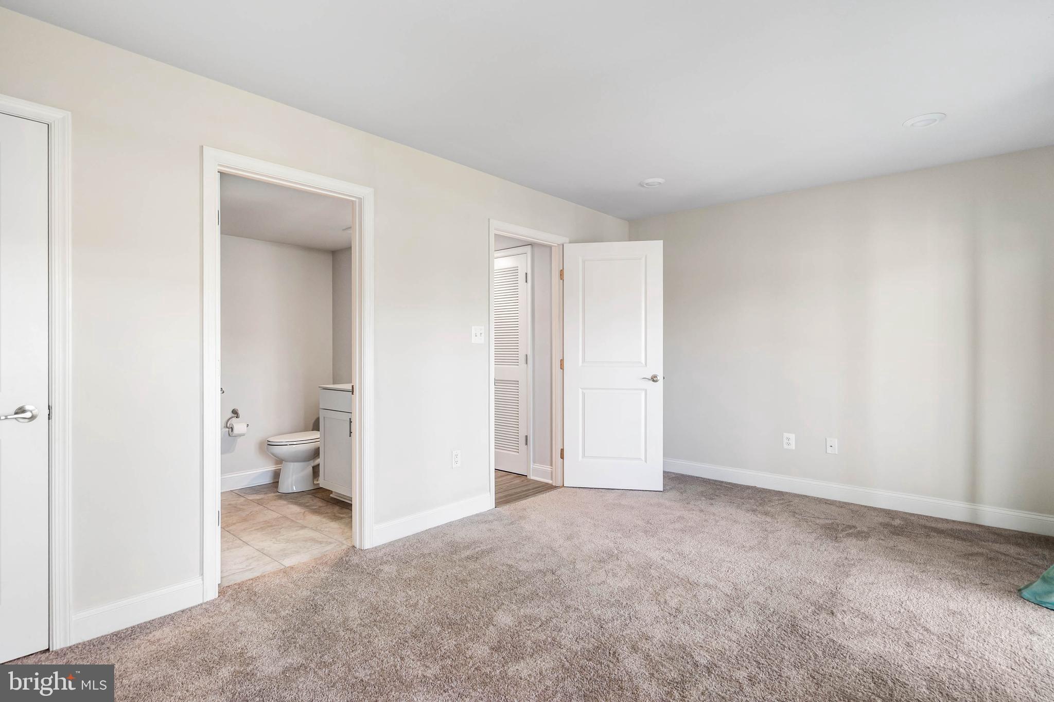 35303 Wright Way Millsboro, DE 19966 - Photo 5 of 26 a view of room with windows and bathroom view