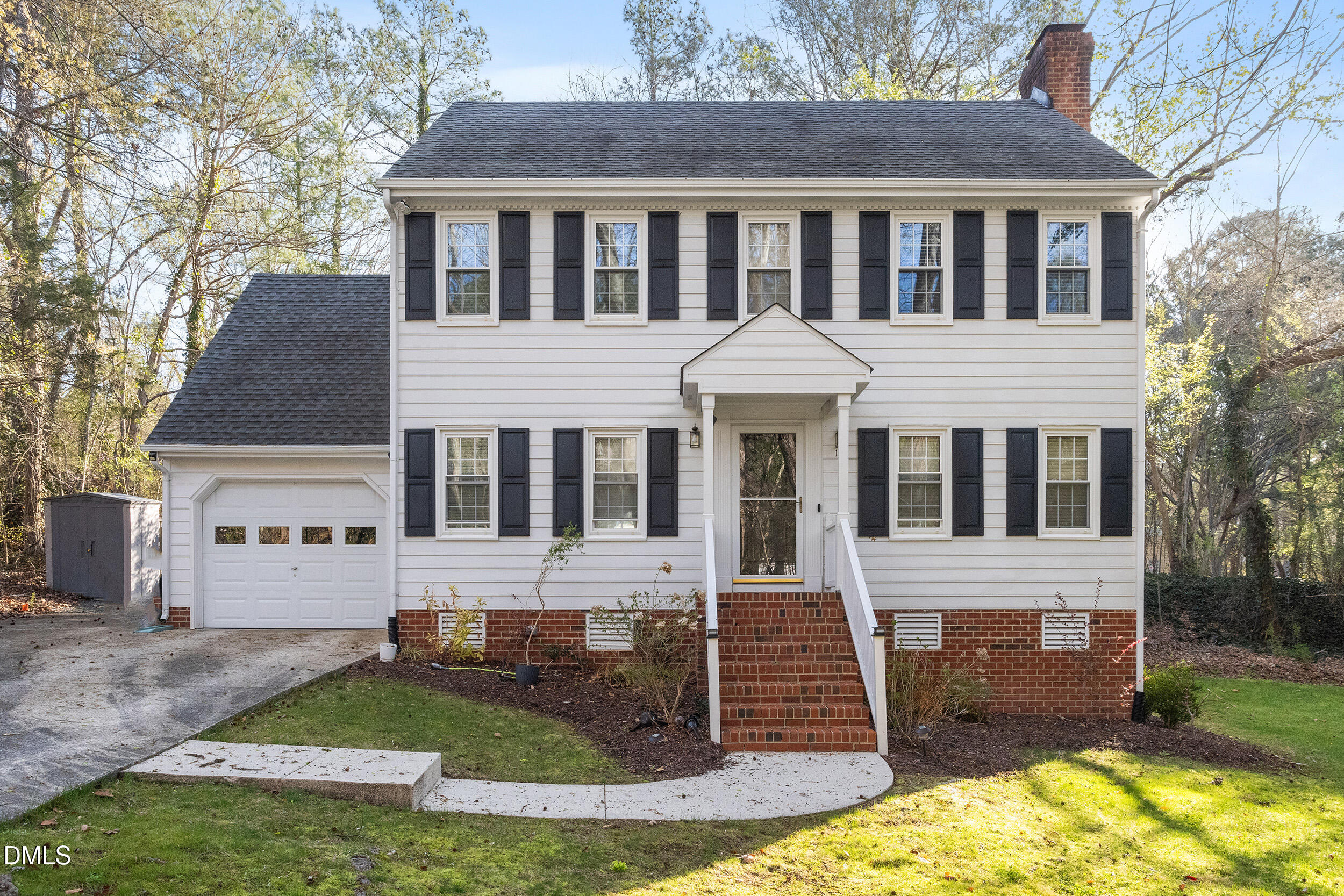 105 Barrett Place Durham, NC 27713 - Photo 1 of 25 a front view of a house with a yard