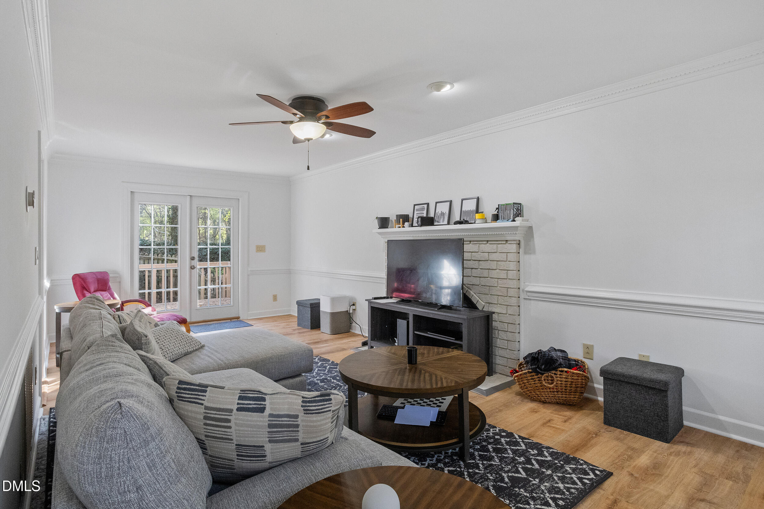105 Barrett Place Durham, NC 27713 - Photo 12 of 25 a living room with furniture and a fireplace