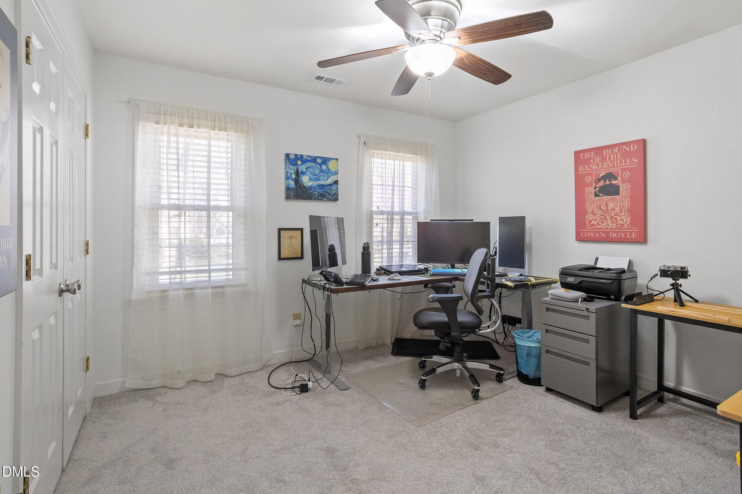 105 Barrett Place Durham, NC 27713 - Photo 23 of 25 a view of a workspace with furniture and a window