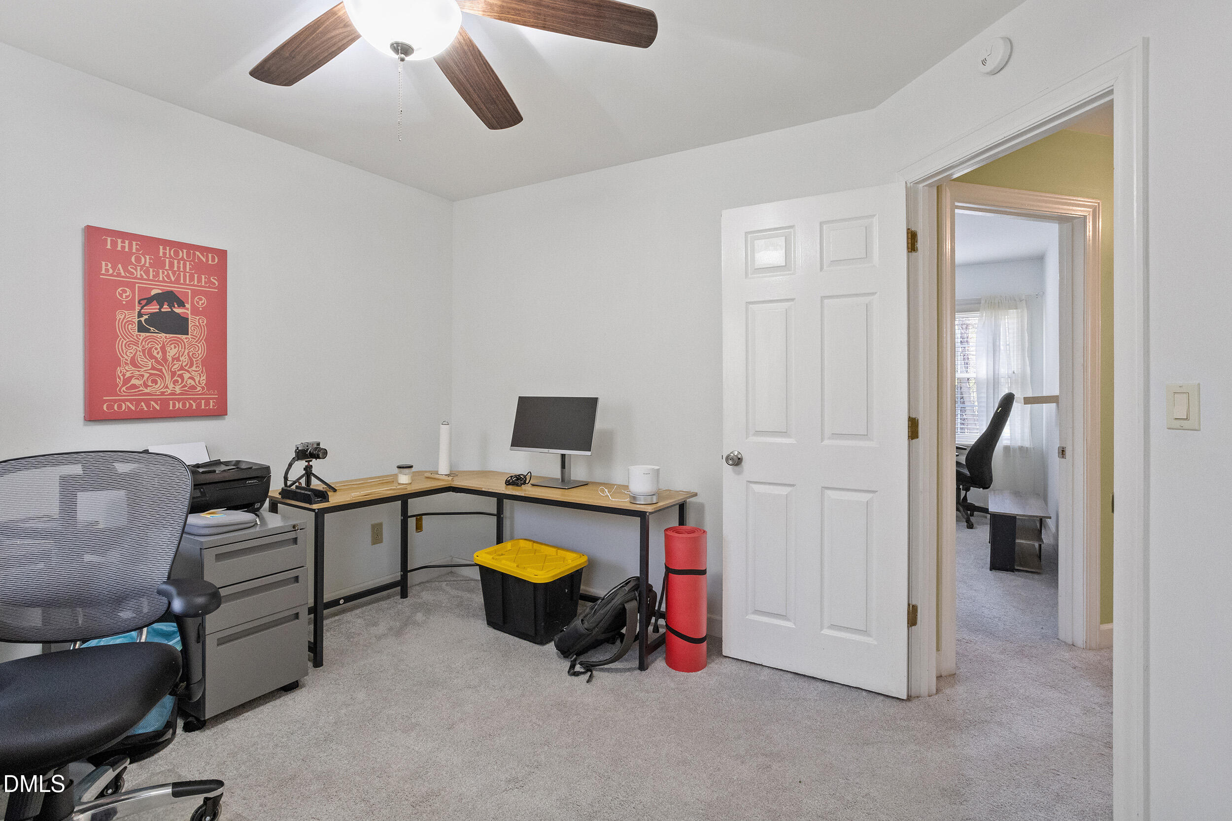 105 Barrett Place Durham, NC 27713 - Photo 24 of 25 a view of a workspace with a couch and a cabinet