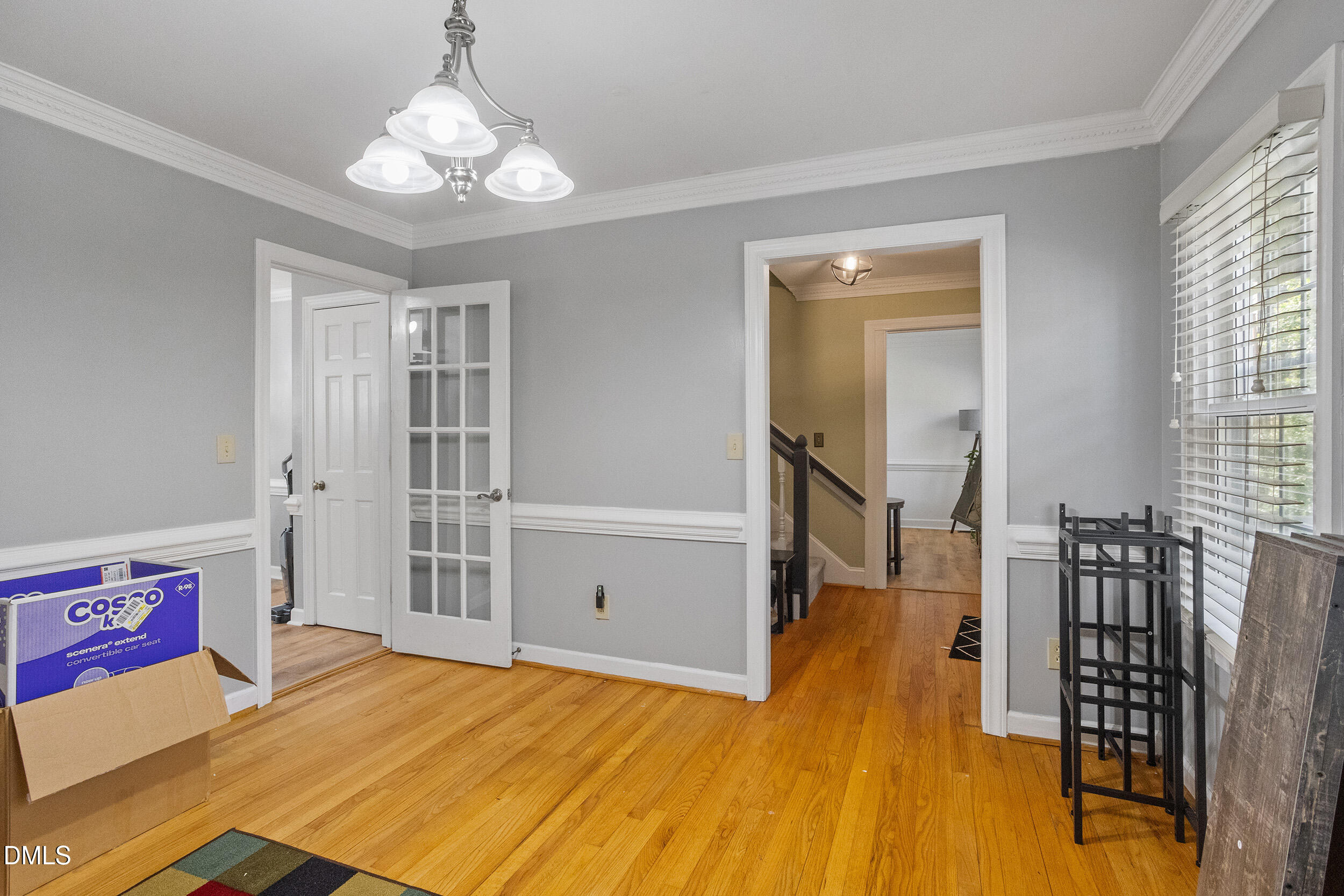 105 Barrett Place Durham, NC 27713 - Photo 10 of 25 a bedroom with a bed and wooden floor