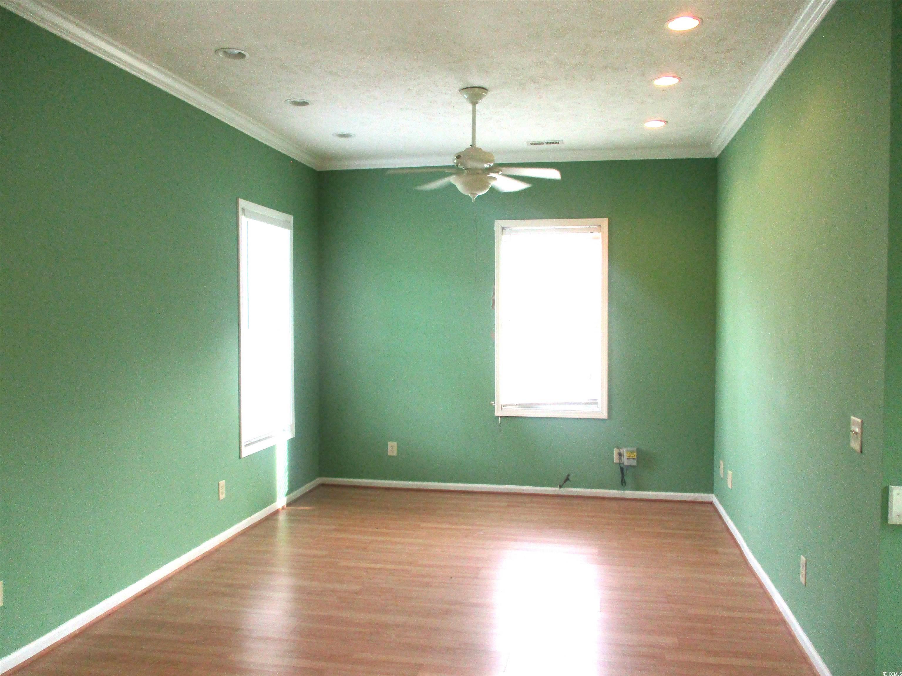 730 Highway 348 Loris, SC 29569 - Photo 17 of 36 Empty room with light wood-type flooring, ceiling