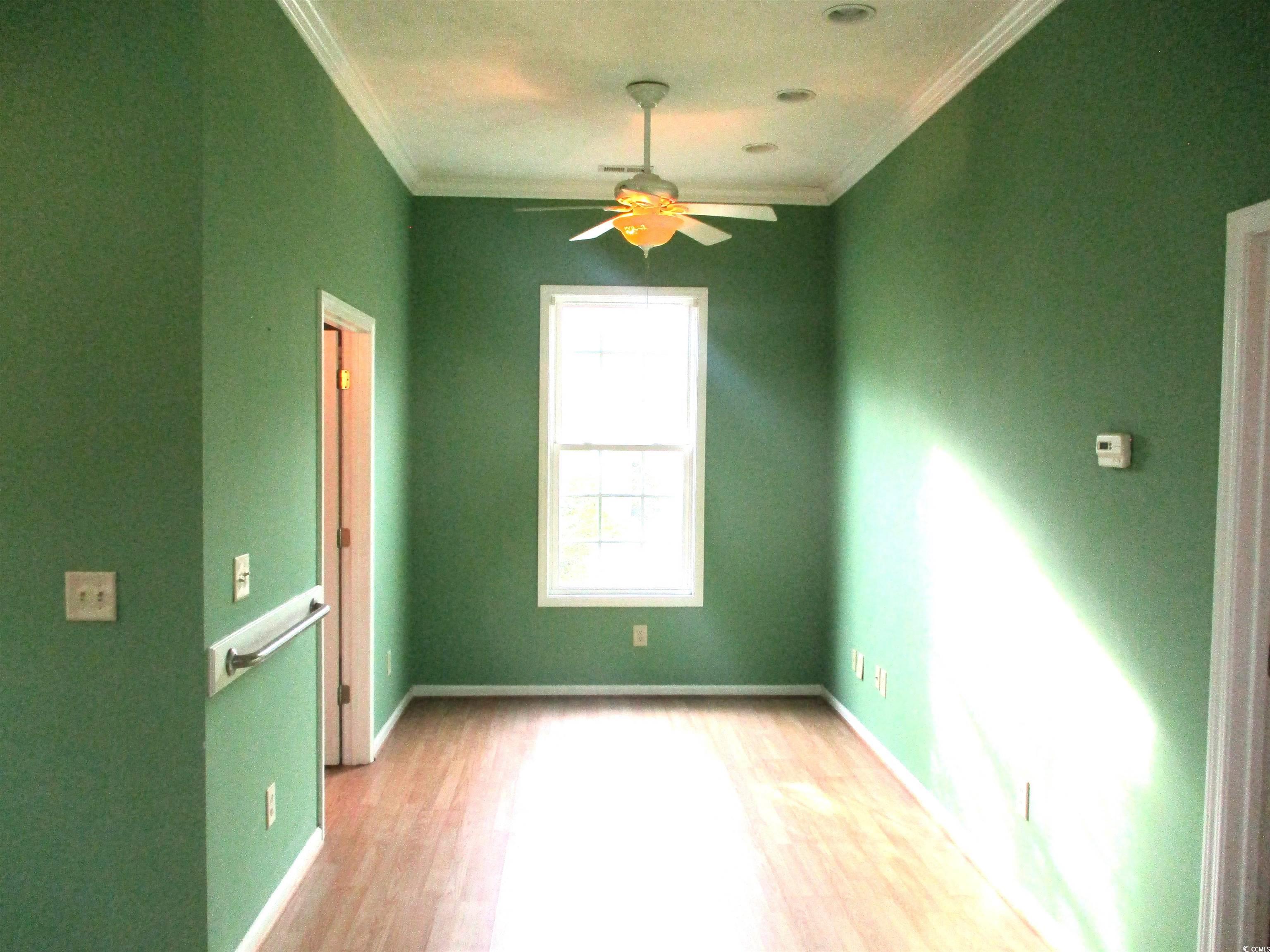 730 Highway 348 Loris, SC 29569 - Photo 18 of 36 Unfurnished room with ceiling fan, light hardwood