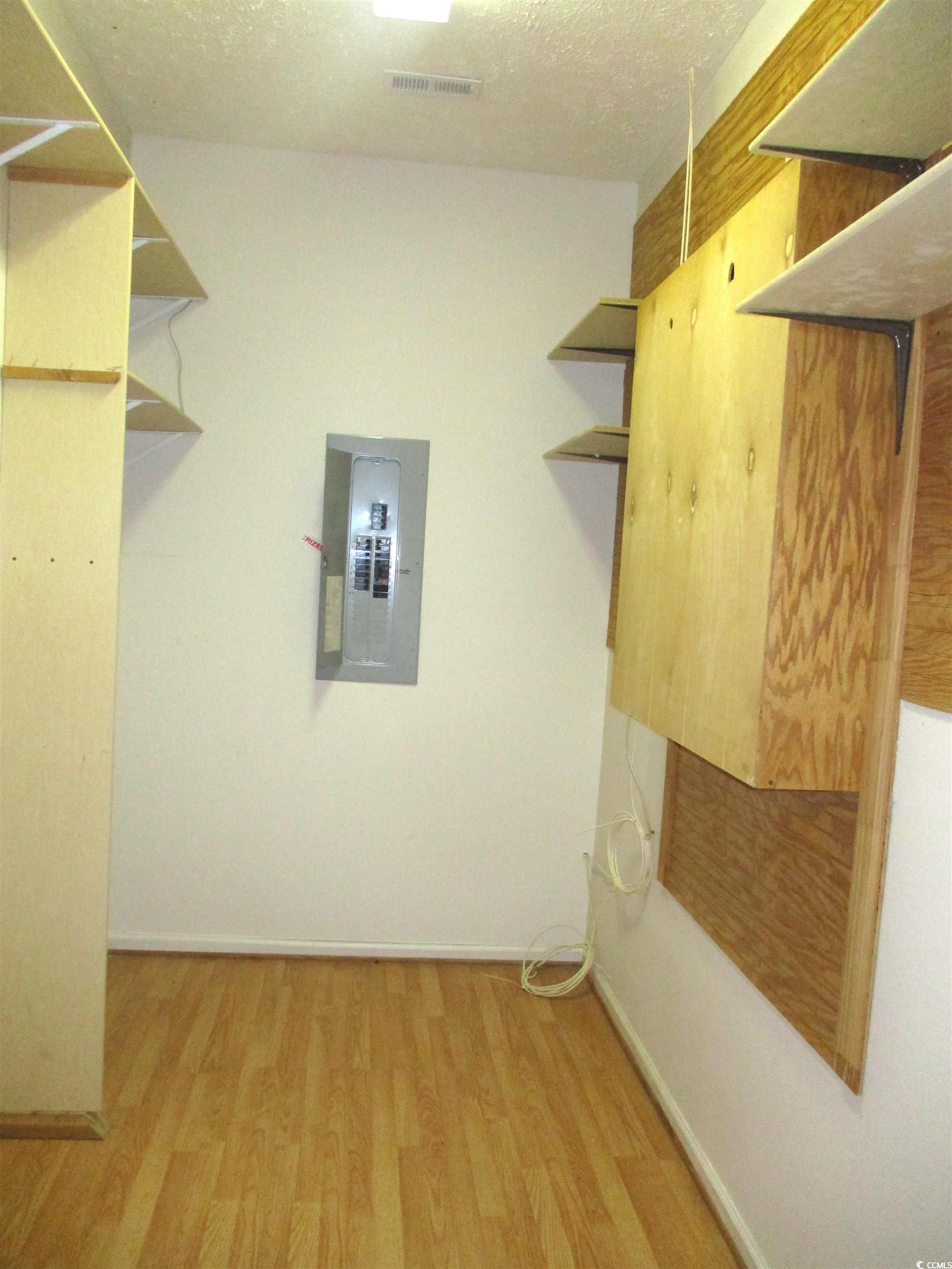 730 Highway 348 Loris, SC 29569 - Photo 29 of 36 Spacious closet with electric panel and light hard