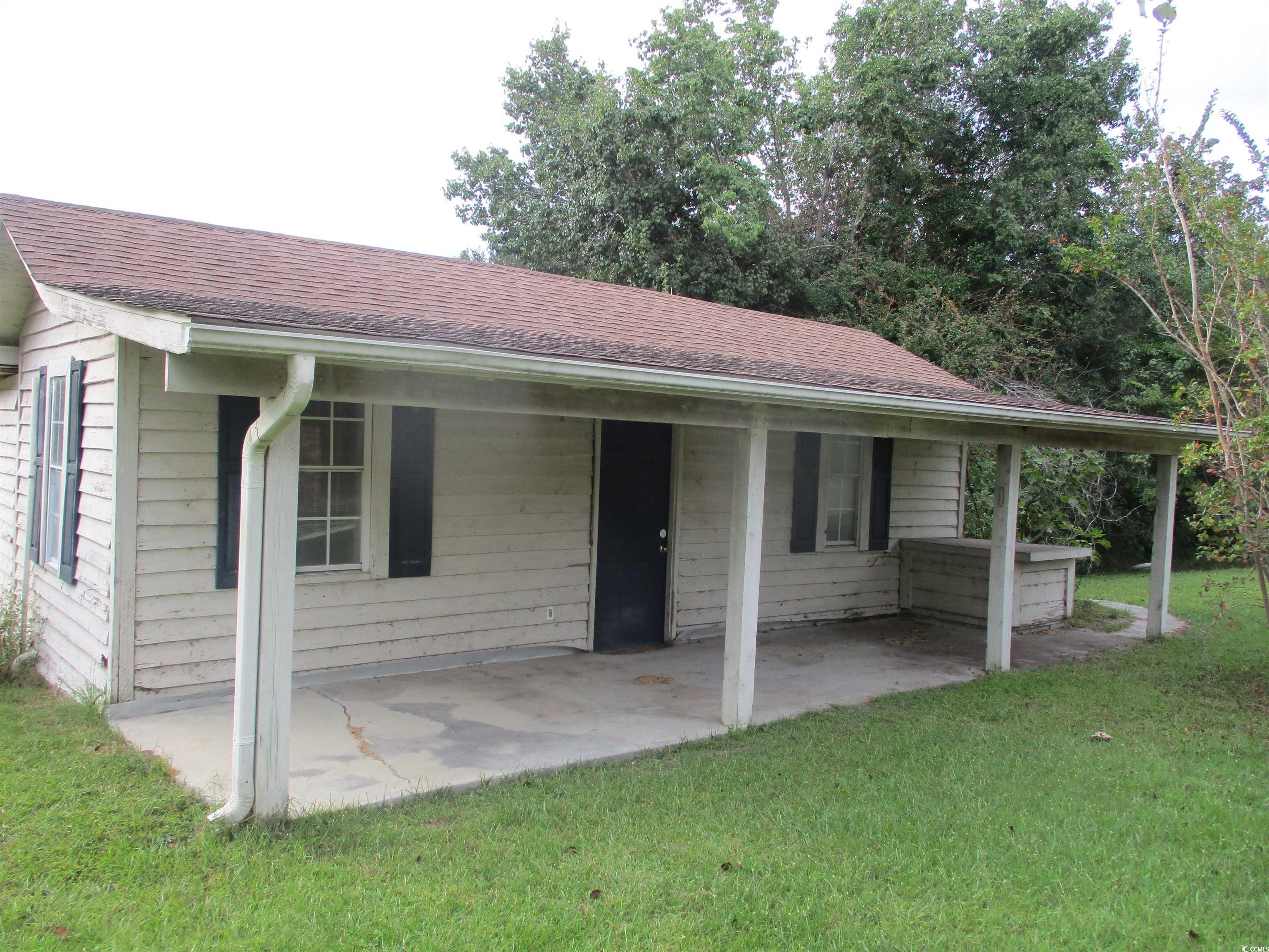 730 Highway 348 Loris, SC 29569 - Photo 31 of 36 View of front facade featuring a front lawn and a