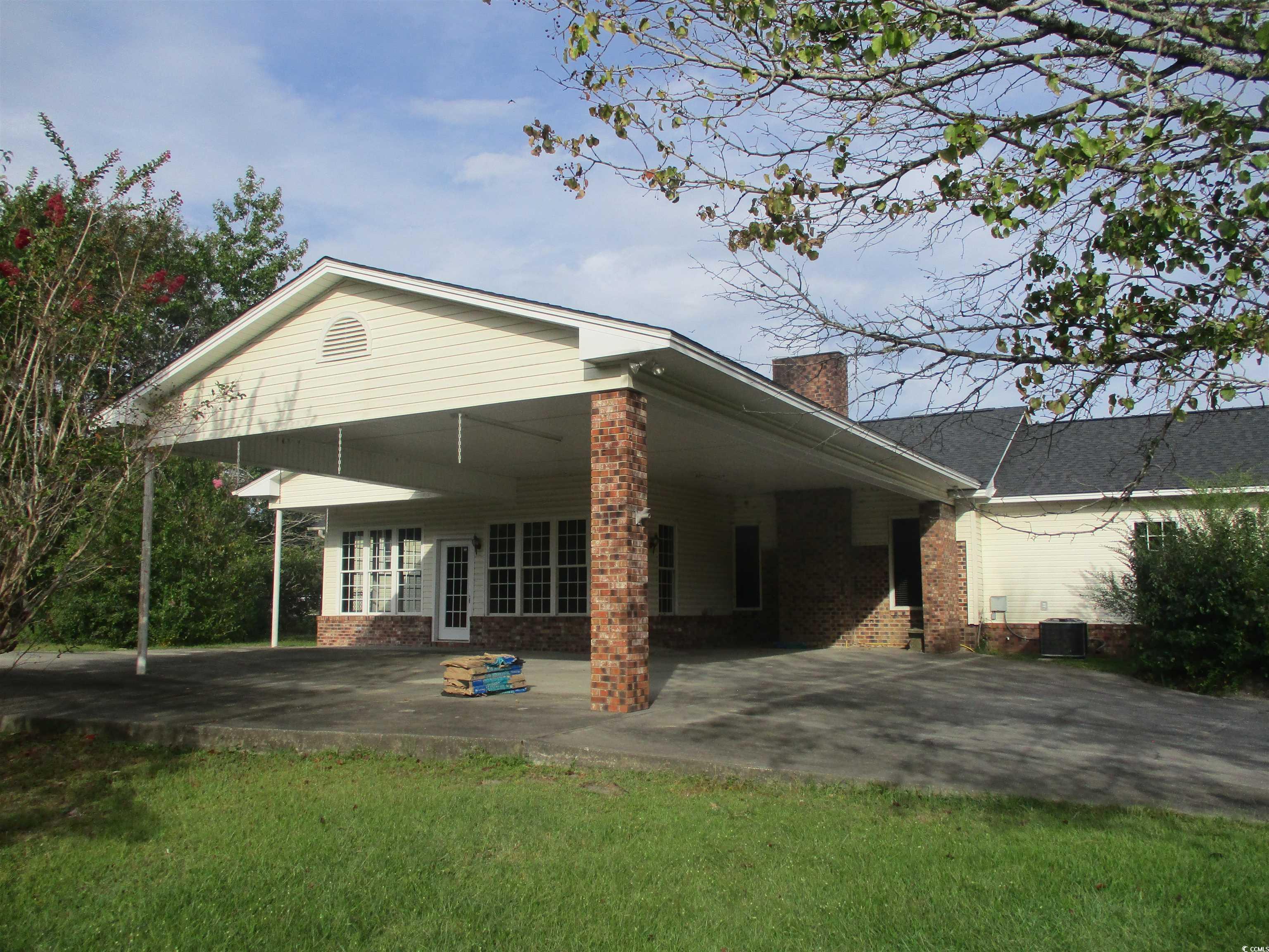 730 Highway 348 Loris, SC 29569 - Photo 6 of 36 Back of property with central air condition unit,