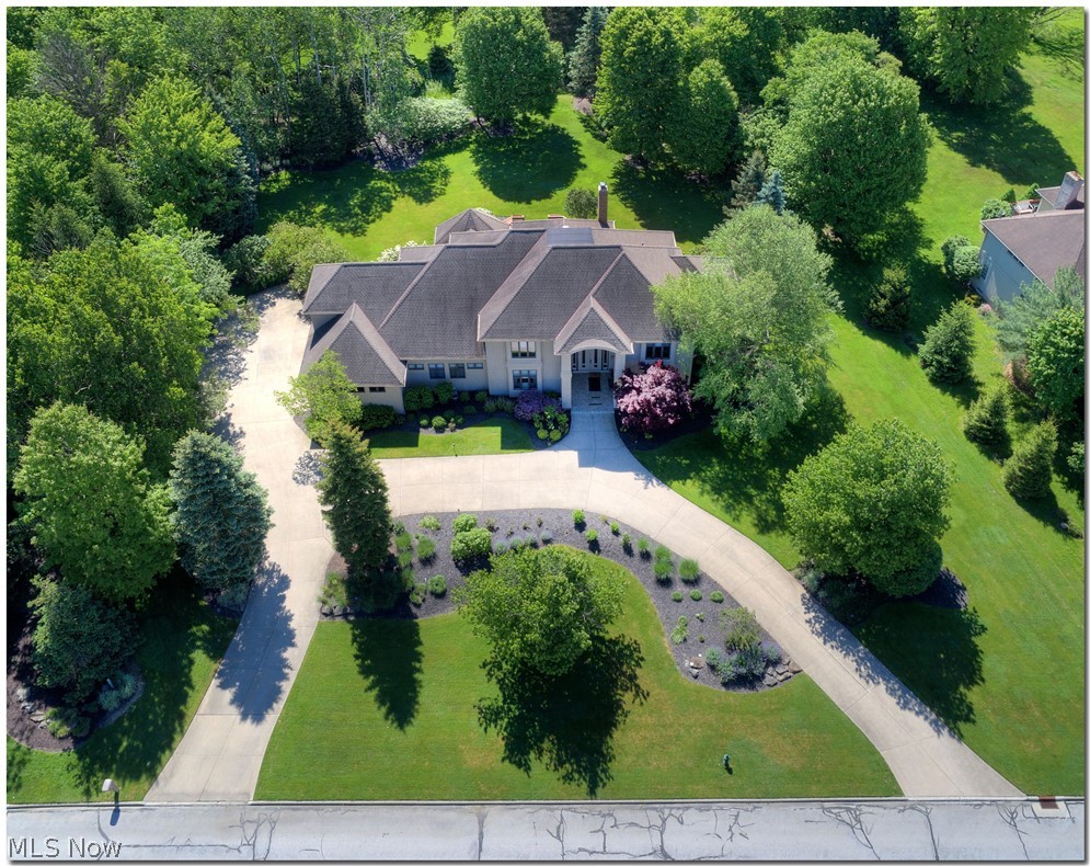 2569 Ginger Wren Road Cleveland, OH 44124 - Photo 2 of 35 Stunning landscaping, private lush gardens is a prefect setting for outdoor entertaining.