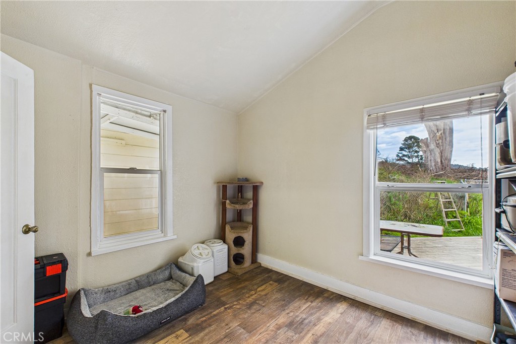 5863 Elk River Road Eureka, CA 95503 - Photo 17 of 42 a living room with furniture and a window
