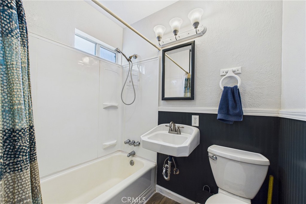 5863 Elk River Road Eureka, CA 95503 - Photo 24 of 42 a bathroom with a sink toilet and shower