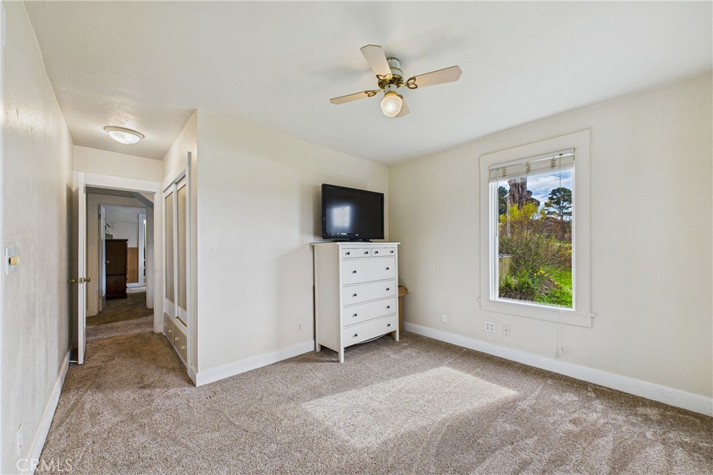 5863 Elk River Road Eureka, CA 95503 - Photo 26 of 42 wooden floor in an empty room with a window