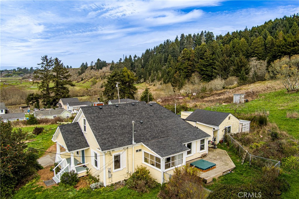 5863 Elk River Road Eureka, CA 95503 - Photo 3 of 42 an aerial view of multiple houses with yard