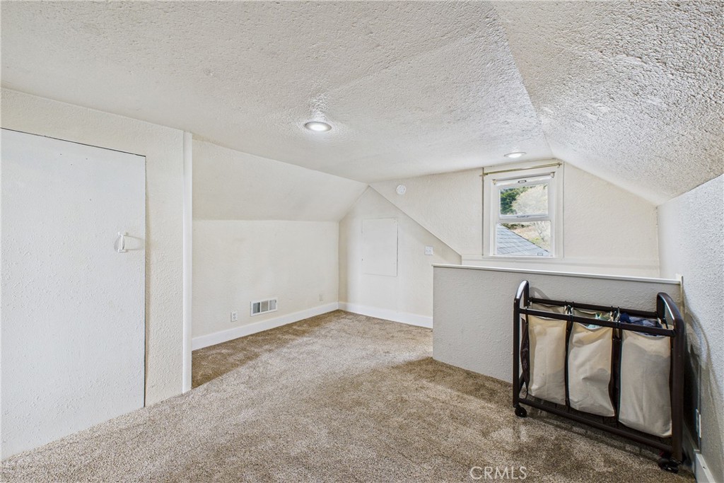 5863 Elk River Road Eureka, CA 95503 - Photo 31 of 42 an empty room with windows