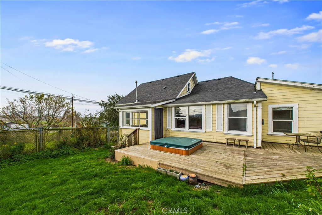 5863 Elk River Road Eureka, CA 95503 - Photo 36 of 42 a front view of a house with a yard table and chairs