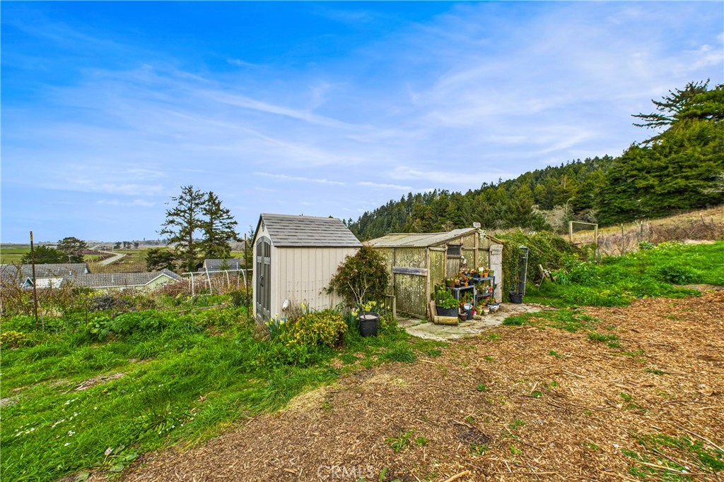 5863 Elk River Road Eureka, CA 95503 - Photo 40 of 42 a view of a house with a yard