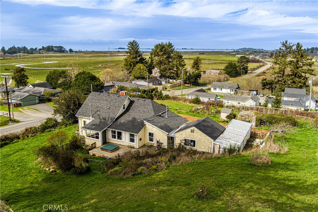 5863 Elk River Road Eureka, CA 95503 - Photo 8 of 42 an aerial view of residential houses with outdoor space and ocean view