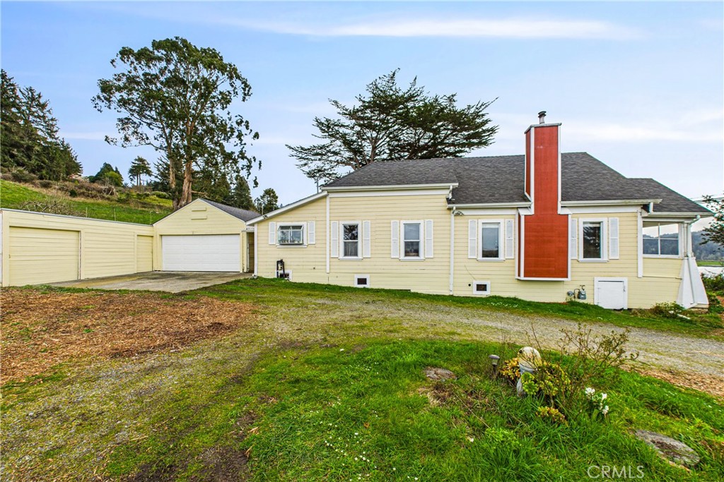 5863 Elk River Road Eureka, CA 95503 - Photo 10 of 42 a view of a yard with a house