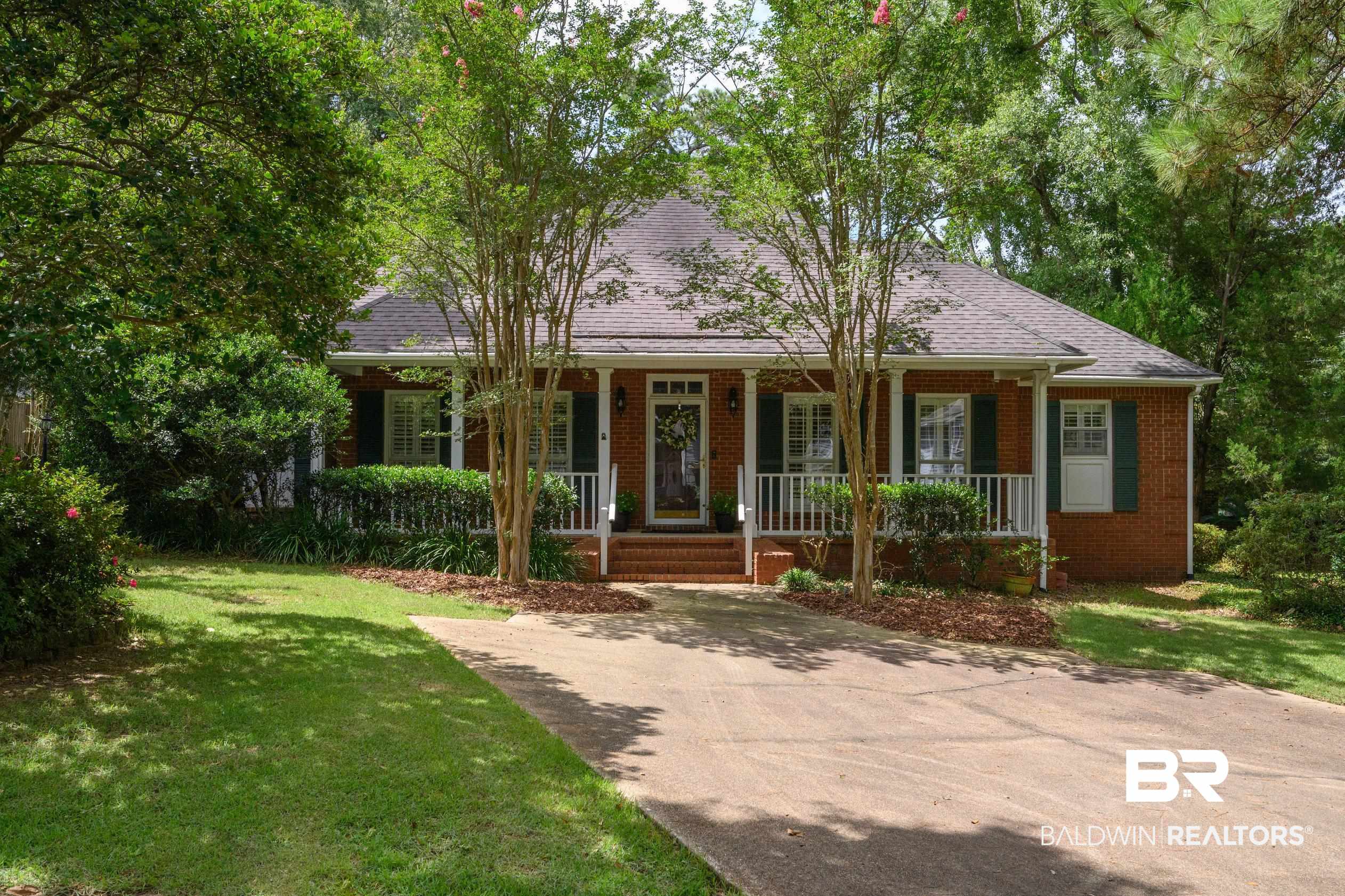 6638 Jackson Square Daphne, AL 36526 - Photo 48 of 62 View of front facade featuring a porch and a front yard