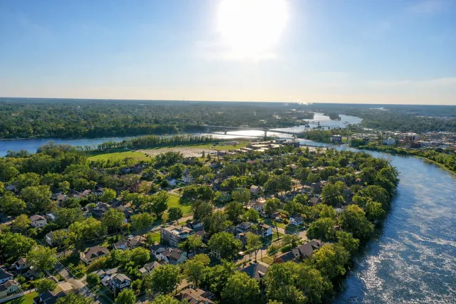 a view of a lake with a city