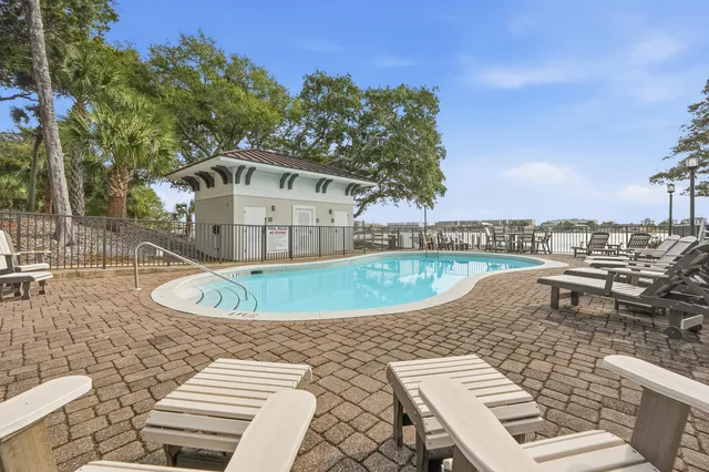 a view of swimming pool from a balcony